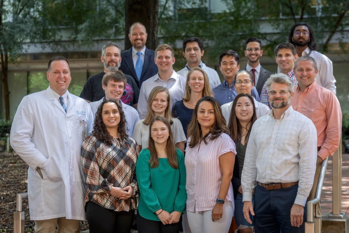 University of North Carolina research team gathered outdoors.
